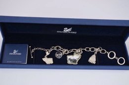 Браслет на руку Swarovski c 4-мя подвесками-оригинал - Киев