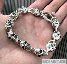 Серебряный мужской браслет с черепами с натуральными гранатами - Киев