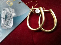 Серьги из серебра с позолотой и циркониями - Киев