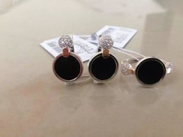 Серебряный набор кольцо и серьги с нат. ониксом и золотыми пластинами - Львов